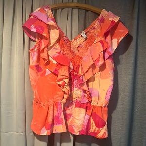 NWOT- Medium Sofia Vergara sleeveless ruffled blouse.